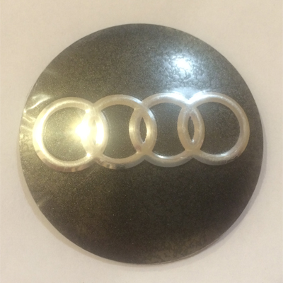 Наклейка на диск Audi 56 выпуклый серый с логотипом на колпачок колесных дисков